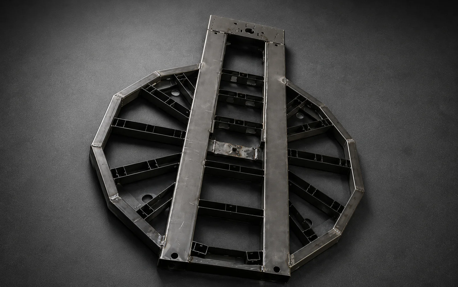 MIG-welded machinery base frame manufactured from laser-cut structural components