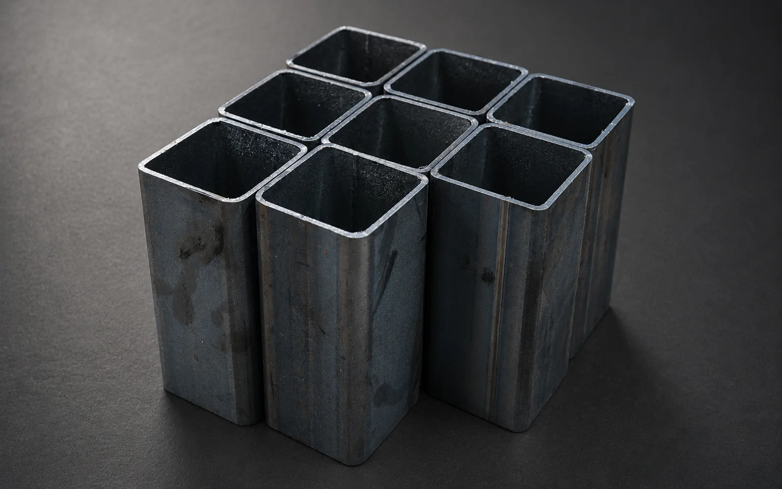 Laser-cut holes in carbon steel tube