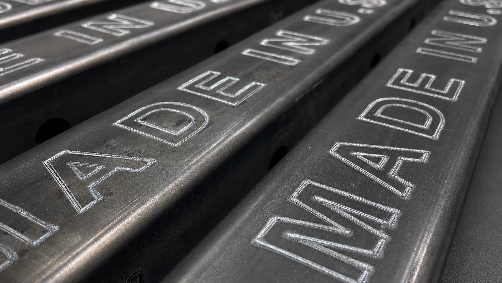 Engraved orientation references on square tube
